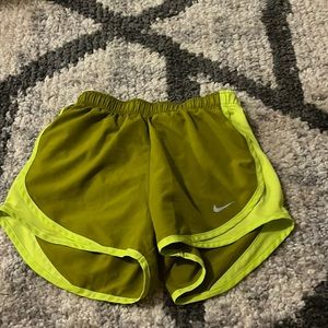 Neon, yellow Nike shorts